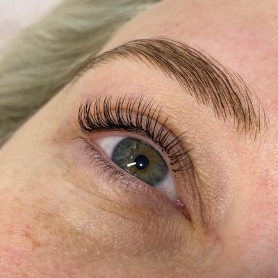 closeup of a female who has just had classic eyelash extensions applied